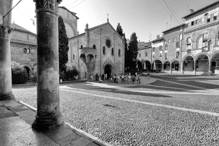 Bologna, Italy -September 04, 2016.Group of tourists in front of the Catholic church in the historic Piazza Santo Stefano in Bologna, Italyのeditorial素材