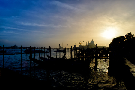 Venice, Italy - October 16, 2016:gondolas at sunset in Veniceのeditorial素材