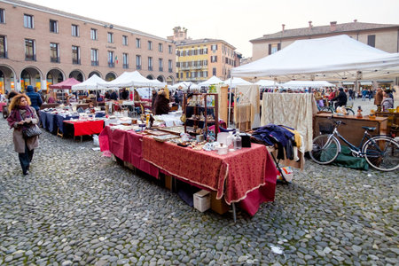 Modena, Italy -January 28, 2017.People visit the traditional hand market in Piazza Grande, Modena, Italyのeditorial素材