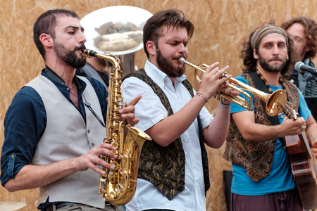 FERRARA, Italy - August 20, 2016: Buskers Festival 2016 in Ferrara, Emilia Romagna, Italy. Busker Festival is a popular event with street artists which is held annually in the historic center of Ferrara.In the picture a musician playing the accordionのeditorial素材