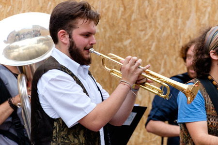 FERRARA, Italy - August 20, 2016: Buskers Festival 2016 in Ferrara, Emilia Romagna, Italy. Busker Festival is a popular event with street artists which is held annually in the historic center of Ferrara.In the picture a musician playing the accordionのeditorial素材