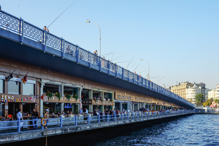 Istanbul, Turkey- September 18, 2017: View of the Galata Bridge in Istanbul, Turkey, characteristic for many tourist restaurants and fishermenのeditorial素材