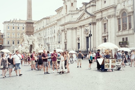 ROME, ITALY - 29 JUNE 2018: Tourists visit the famous and beautiful Piazza Navonaのeditorial素材