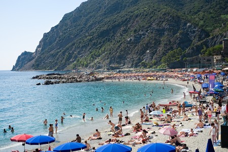 Monterosso, Italy- September 18, 2018: Bathers on a Ligurian beach of the famous Cinque Terre, take the last sunny summer daysのeditorial素材