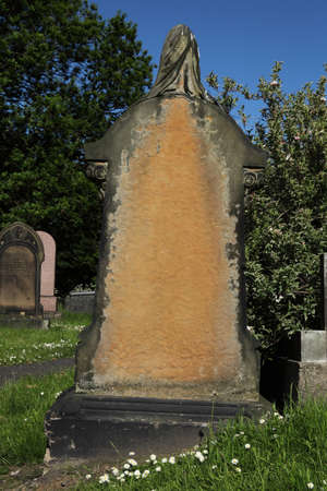 Blank Eroded Tombstone in a Cemeteryの写真素材