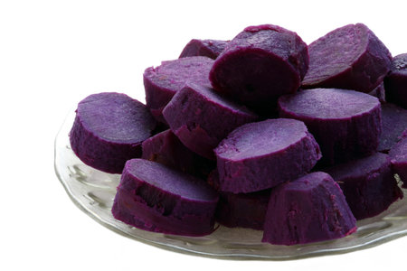 a tropical plant grown for its thick root which is boiled and eaten の写真素材