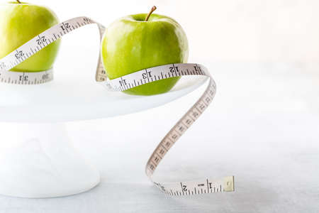 Apples on a cake stand.の写真素材