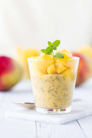 Front view of a mango chia pudding parfait ready for eating.の写真素材