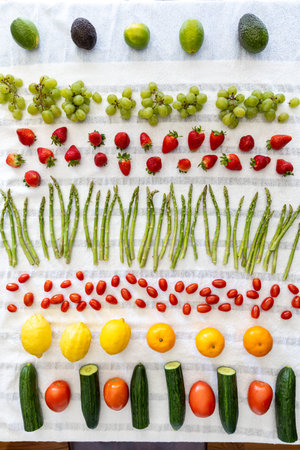 Rows of freshly washed produce drying on a Turkish towel.の写真素材