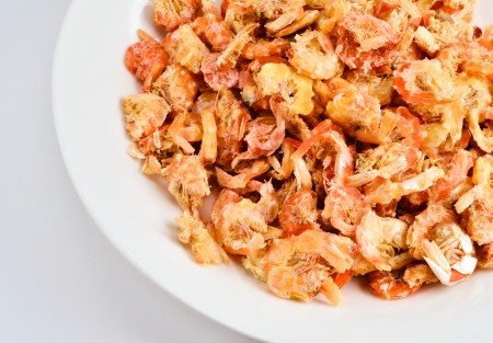 Pile Of Dry Shrimp In White Plateの写真素材