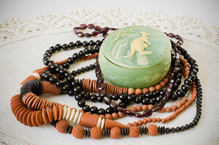 Set of necklace on white fabric の写真素材