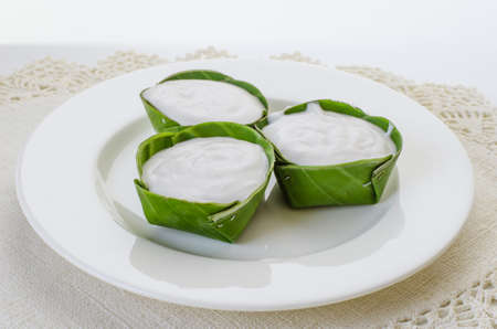 Thai dessert pudding with coconut topingの写真素材