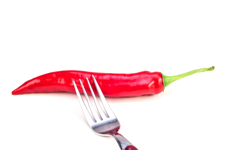 Red Chili with fork on white backgroundの写真素材
