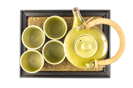 Top view Image of tea set in bamboo tray on white backgroundの写真素材