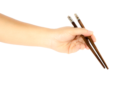 Hand with chopstick isolate on white backgroundの写真素材