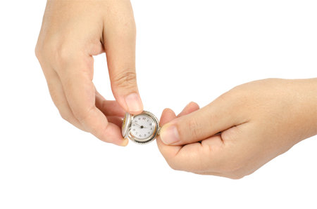 Image of clock in woman's hand isolate on white background
