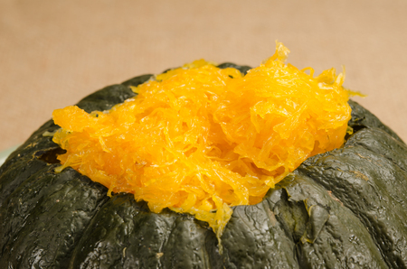 Thai's food, Egg custard in pumpkin in green ceramic dishの写真素材