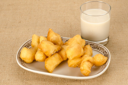 Image of Thai fried dough stick in ceramic dish