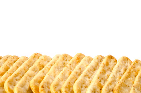 Image of saltine crackers on white background