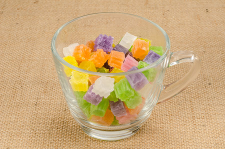 Image of Thai dessert crispy jelly in white ceramic dish on fabricの写真素材