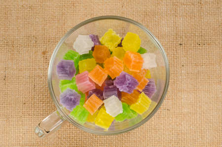 Image of Thai dessert crispy jelly in white ceramic dish on fabricの写真素材