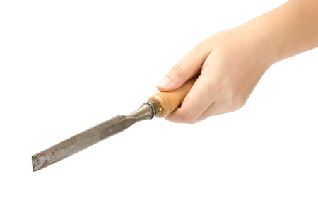 Image of carpenter chisel holding by handの写真素材