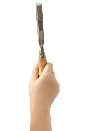 Image of carpenter chisel holding by hand