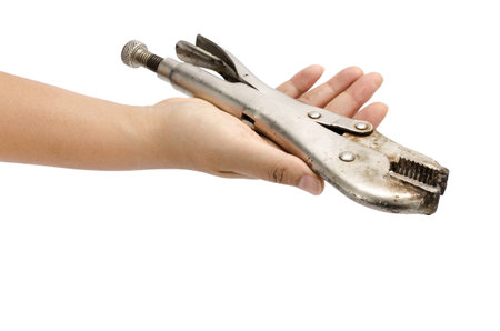 Image of locking pliers hold by handの写真素材