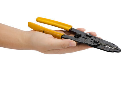 Image of hand holding cutting pliers isolate on white backgroundの写真素材