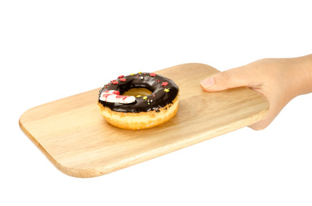Image of donuts on wooden cutting board isolate on white backgroundの写真素材