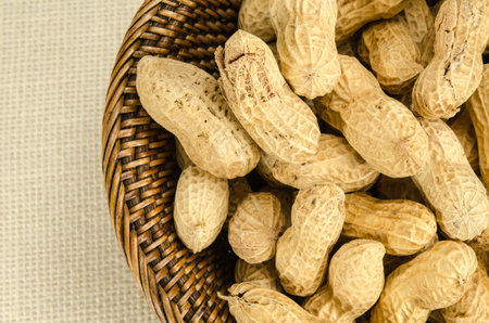 Image of roasted peanuts on sack fabric