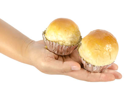 Bread buns in woman hand isolate on white backgroundの写真素材