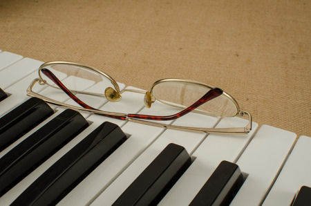 Part of keyboard on brown sack backgroundの写真素材