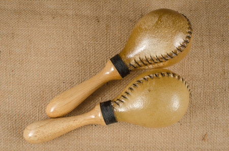 Image of maracas a latin percussion on brown sack backgroundの写真素材