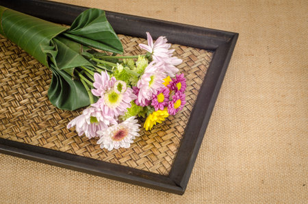 Image of flowers on brown sack  backgroundの写真素材