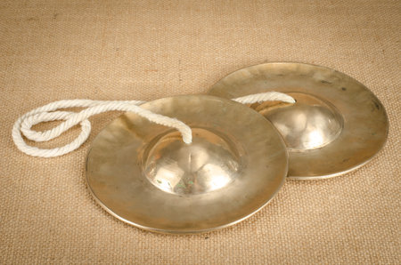 Thai's cymbal on brown sack backgroundの写真素材
