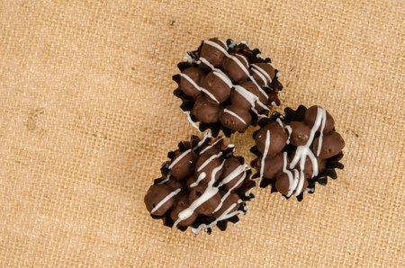 Image of mini  chocolate ball on brown sack background