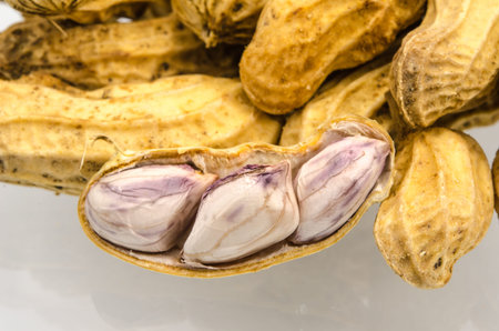 Boiled peanuts on white background