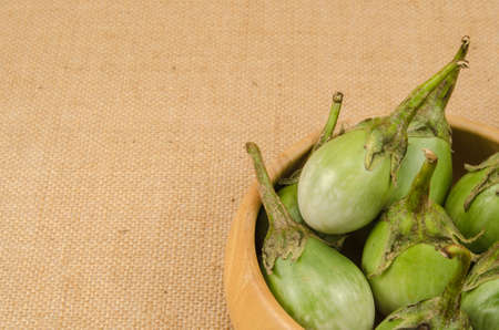Image of eggplant on brown sack backgroundの写真素材