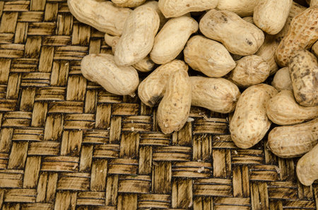 Image of peanuts on bamboo woven