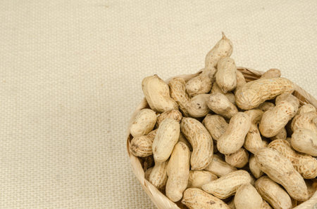 Image of peanuts on fabric background