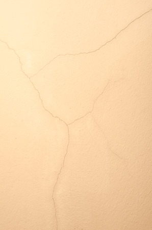 Brown concrete wall texture with crackedの写真素材