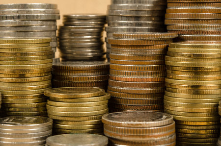 Stack of coins on brown sack background