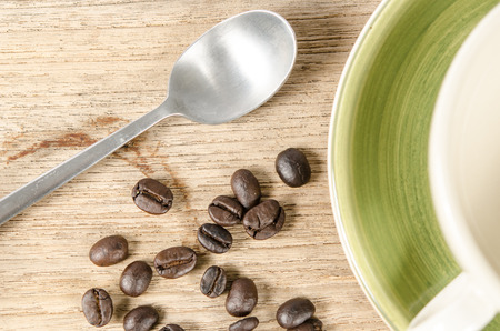 Image of tea set with coffee beans on brown sack backgroundの写真素材