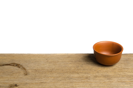 Image of Chinese cup of tea on old wood on white backgroundの写真素材