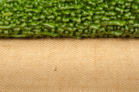 Bitter gourd on brown sack background