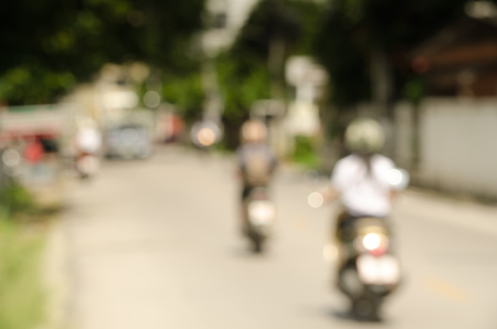 Blurred bike on road in Chiangmai Thailandの写真素材