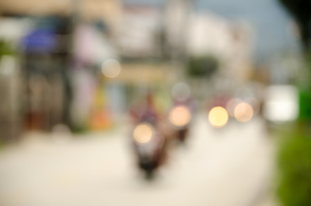 Blurred bike on road in Chiangmai Thailandの写真素材
