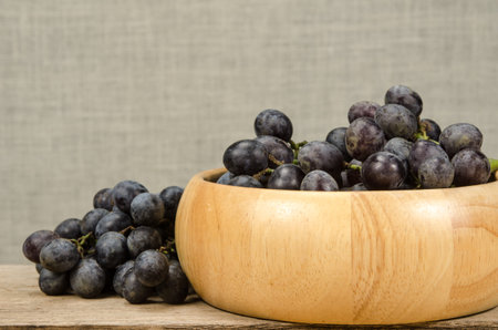 Grape in wooden bowl