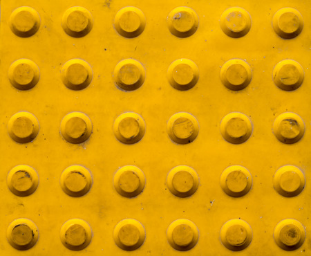 Close up of Blind tactile guide on sidewalkの写真素材